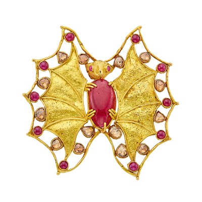 Lot 1077 - Gold, Cabochon Ruby and Diamond Bat Brooch