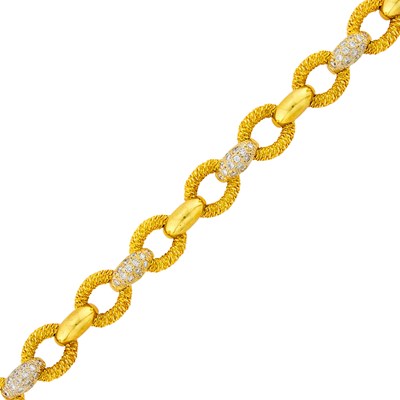 Lot 185 - Two-Color Gold and Diamond Link Bracelet