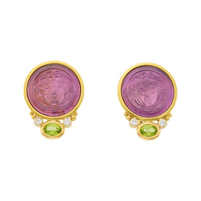 Lot 1220 - Gold, Carved Amethyst, Peridot and Diamond Medusa Earrings