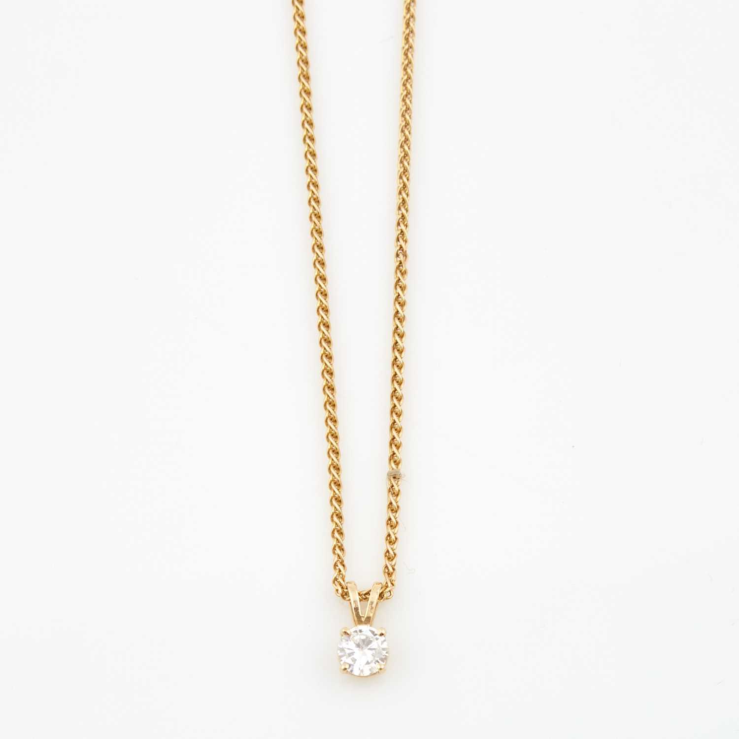Lot 97 - Diamond Solitaire Pendant about 0.50 ct. and Gold Neck Chain, 14K 3 dwt.
