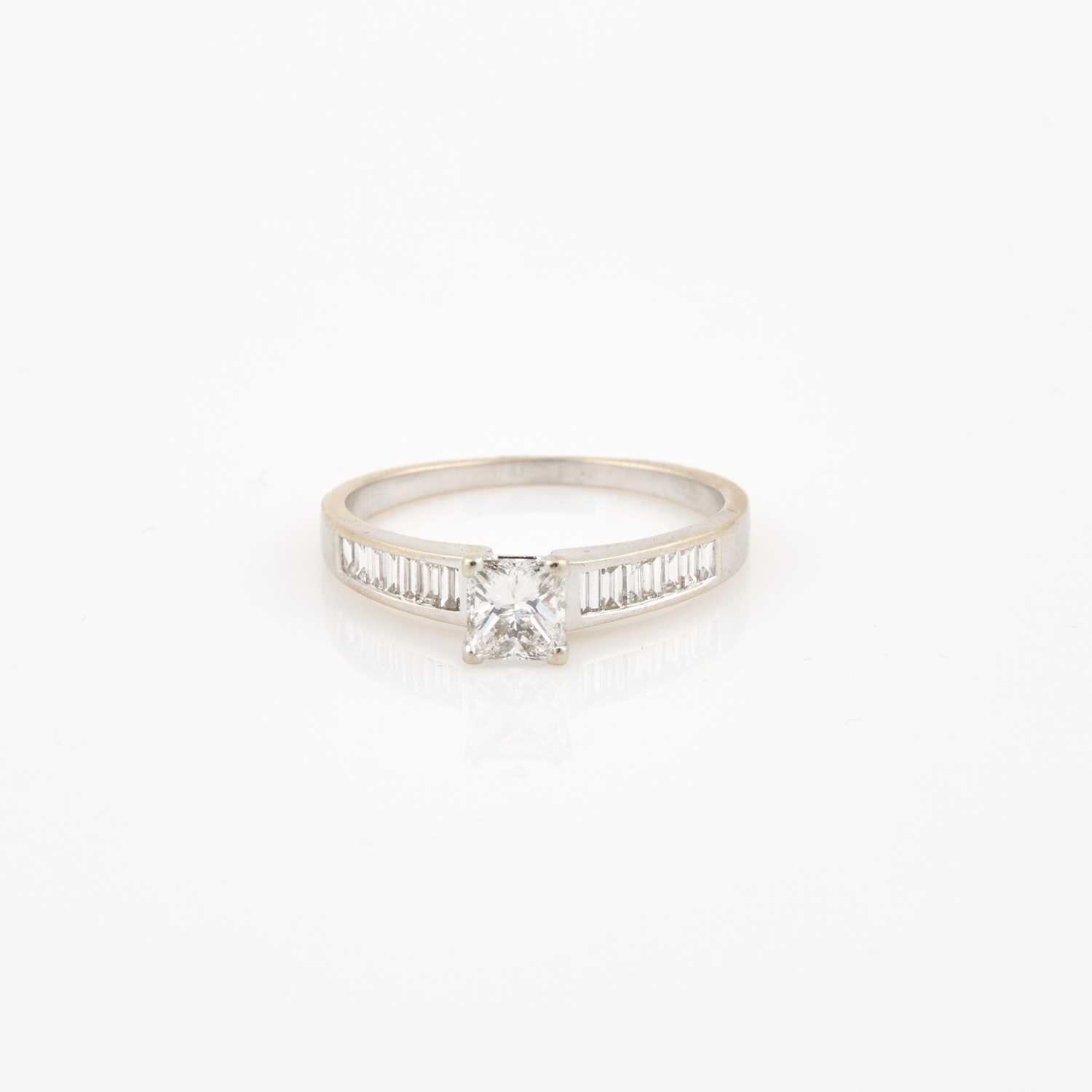 Lot 318 - Diamond Engagement Ring, 15 diamonds, center stone about 0.70 ct., 14 stones about 0.40 ct.,         18K 2 dwt., stone damaged