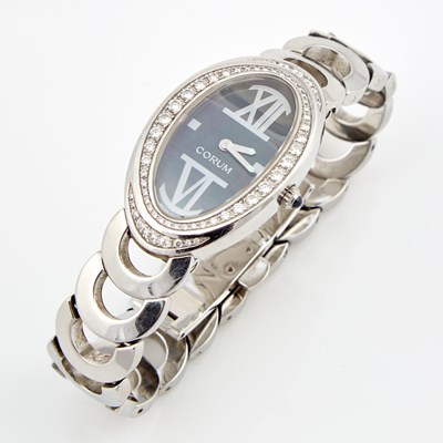 Lot 325 - Ladys Diamond Bracelet Watch, 65 diamonds about 1.00 ct., Corum, Swiss, Metal