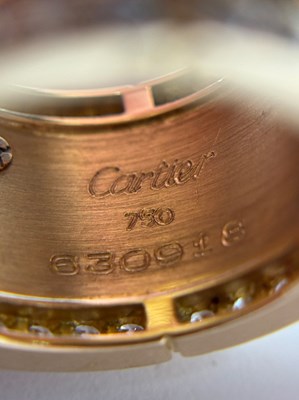 Lot 78 - Cartier Wide Gold and Diamond 'Mahango Panthère' Band Ring, France
