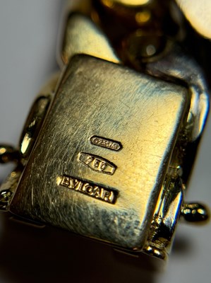Lot 115 - Bulgari Two-Color Gold and Diamond Curb Link Bracelet