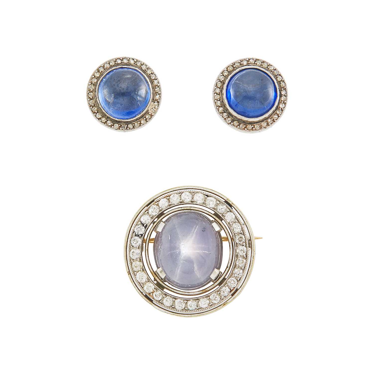 Lot 1084 - Platinum, Star Sapphire and Diamond Pin and Pair of Platinum, Cabochon Synthetic Sapphire and Diamond Earclips