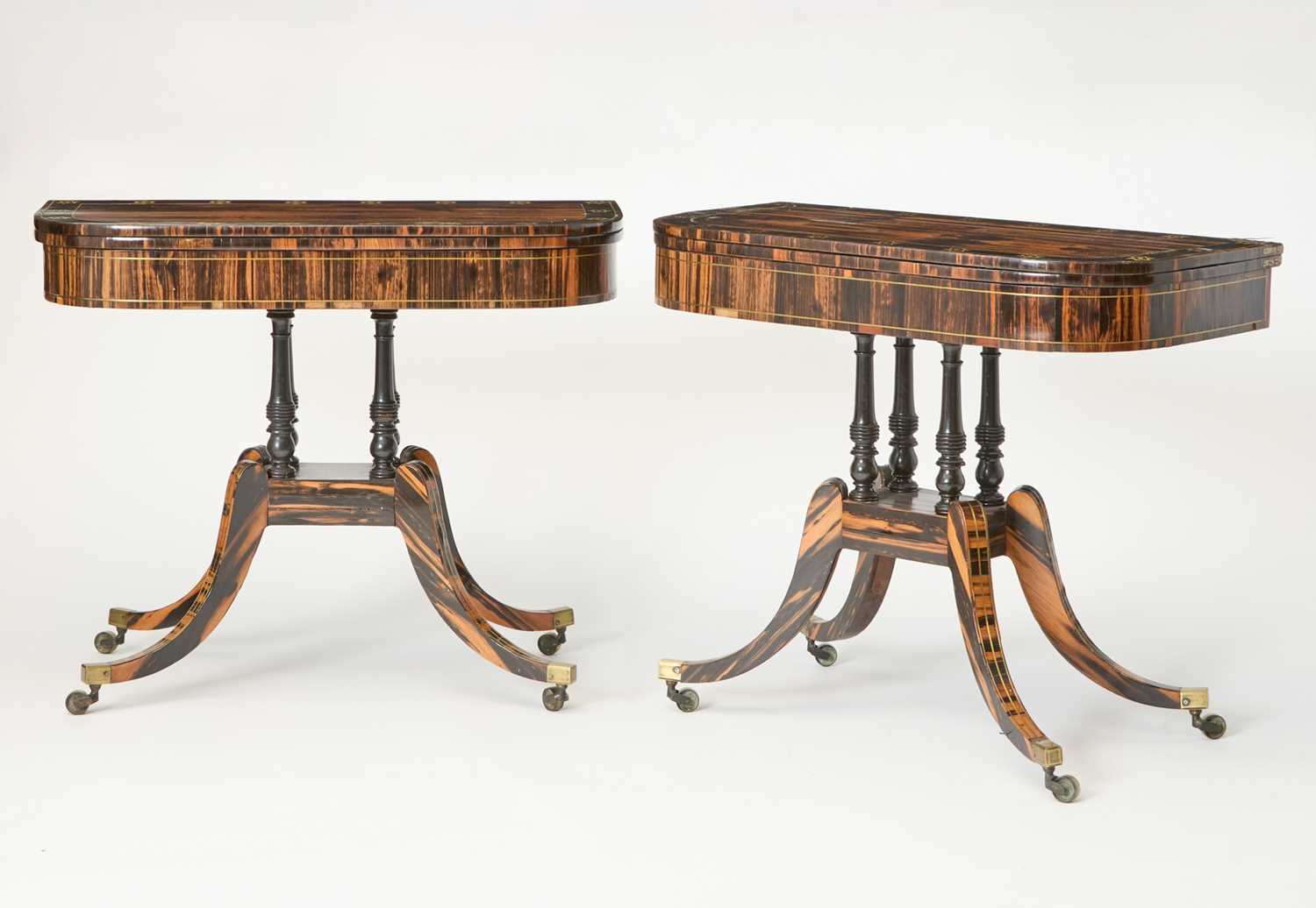 Lot 763 - Pair of Regency Brass-Inlaid Calamander and Ebony Games Tables