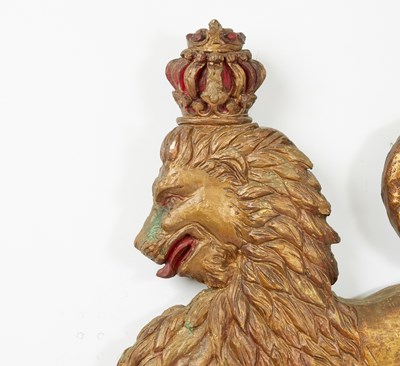 Lot 198 - Painted and Parcel Gilt Lion Wall Plaque