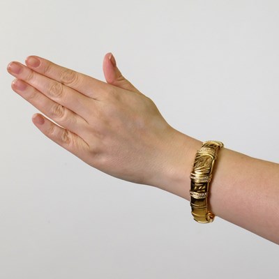 Lot 24 - Ebel Gold, Mother-of-Pearl and Diamond 'Shanta' Bracelet-Watch, Ref. 8057828-12