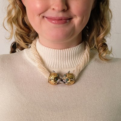 Lot 109 - Multistrand Cultured Pearl, Two-Color Gold, Cabochon Emerald and Diamond Panther Head Torsade Necklace