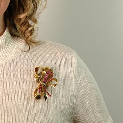 Lot 18 - Gold, Platinum, Ruby and Diamond Bow Clip-Brooch, France
