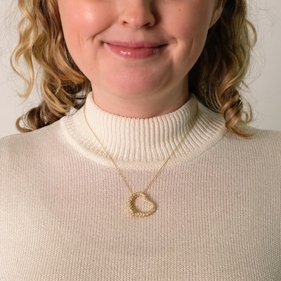 Lot 118 - Tiffany & Co., Elsa Peretti Gold and Diamond 'Open Heart' Pendant with Chain Necklace