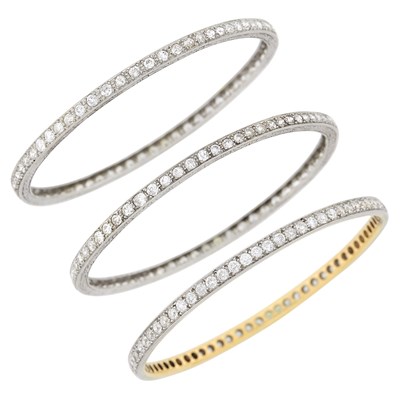 Lot 191 - Pair of Platinum and Diamond Bangle Bracelets and Platinum, Gold and Diamond Bangle Bracelet