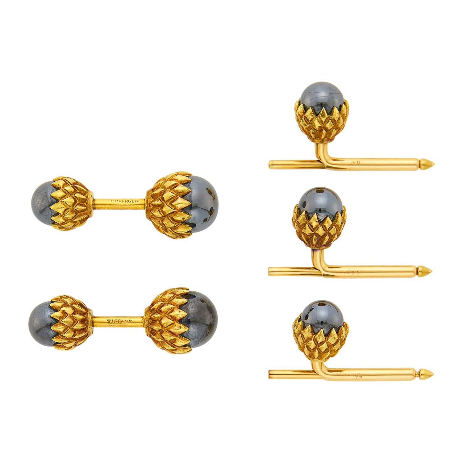 Lot 31 - Tiffany & Co., Schlumberger Pair of Gold and Hematite Acorn Cufflinks and Studs