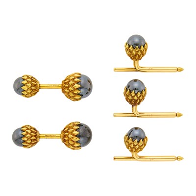 Lot 1045 - Tiffany & Co., Schlumberger Pair of Gold and Hematite Acorn Cufflinks and Studs