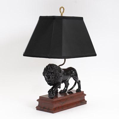 Lot 16 - Ebonized Lion-Form Lamp