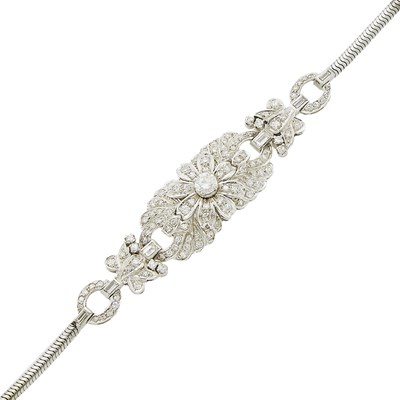 Lot 1163 - Platinum, Low Karat White Gold and Diamond Bracelet