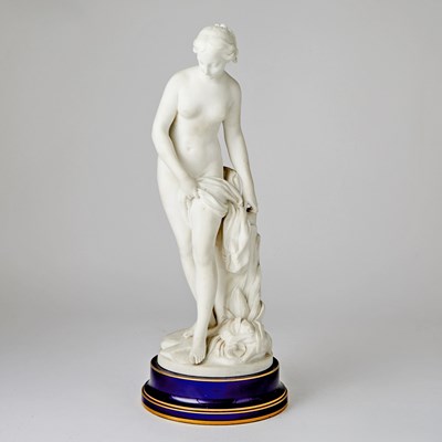 Lot 295 - Sèvres Bisque and Cobalt-Ground Porcelain Figure of a Nude Female Bather