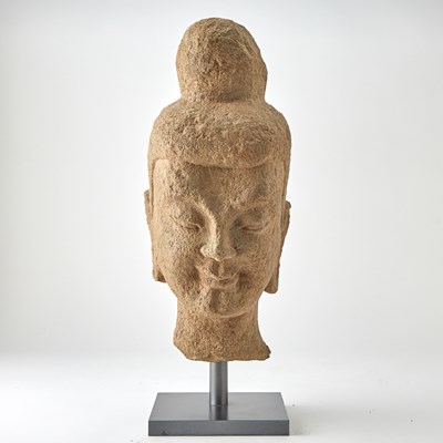 Lot 132 - A Large Chinese Stone Head of a Buddhist Attendant