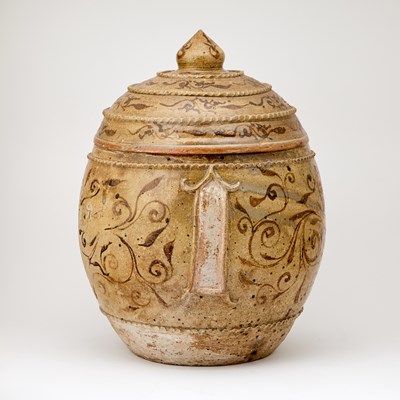 Lot 737 - A Southeast Asian Painted and Ochre Glazed Stoneware Jar and Cover