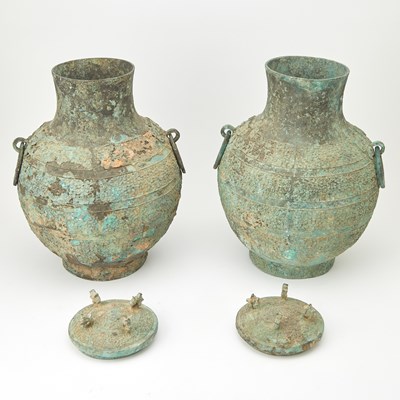 Lot 90 - A Pair of Chinese Bronze Lidded Wine Vessels