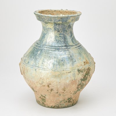 Lot 702 - A Chinese Green Glazed Earthenware Vase