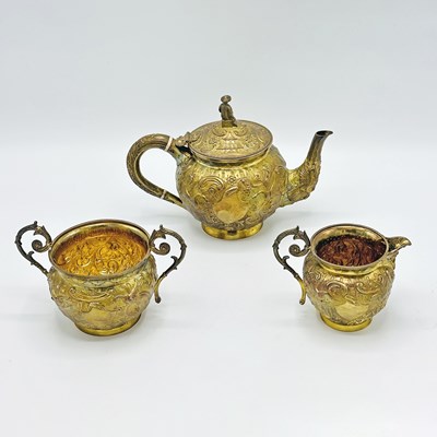 Lot 1164 - Assembled Victorian Sterling Silver Gilt Chinoiserie Tea Service