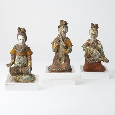 Lot 728a - A Group of Three Chinese Earthenware Musicians