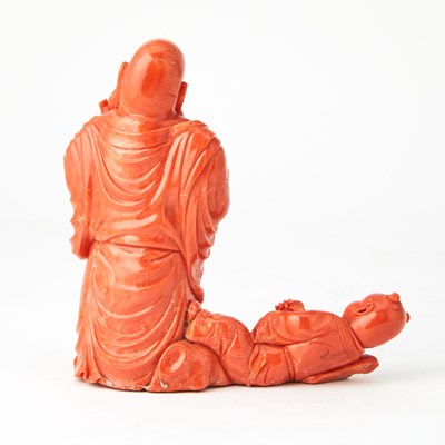 Lot 10 - A Chinese Coral Carving of Budai and an Attendant