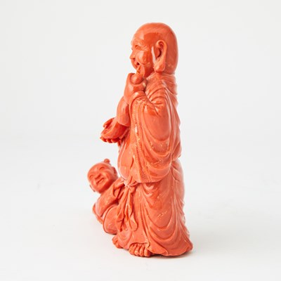 Lot 10 - A Chinese Coral Carving of Budai and an Attendant