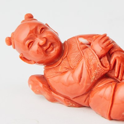 Lot 10 - A Chinese Coral Carving of Budai and an Attendant