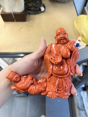 Lot 10 - A Chinese Coral Carving of Budai and an Attendant