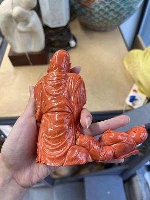 Lot 10 - A Chinese Coral Carving of Budai and an Attendant