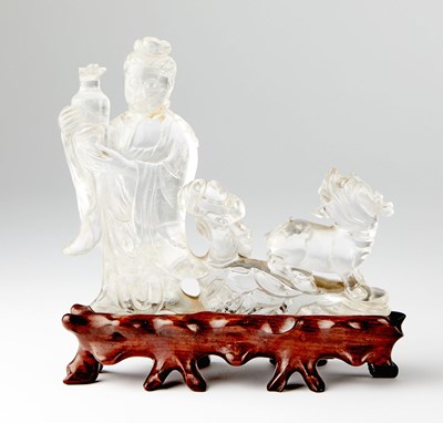 Lot 126 - A Chinese Rock Crystal Carving of a Guanyin and a Beast