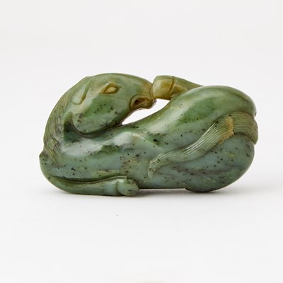 Lot 76 - A Chinese Spinach Jade Carving of a Recumbent Horse