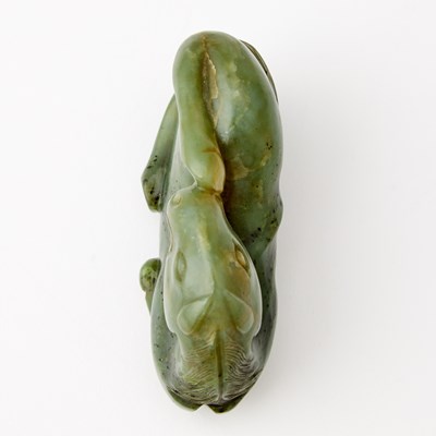 Lot 76 - A Chinese Spinach Jade Carving of a Recumbent Horse
