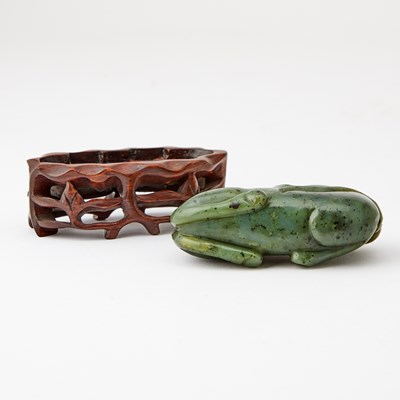 Lot 76 - A Chinese Spinach Jade Carving of a Recumbent Horse