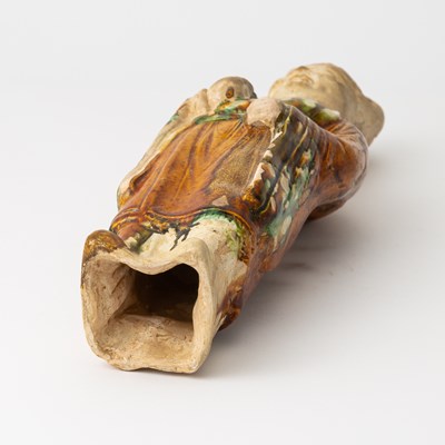 Lot 166 - A Chinese Sancai Glazed Pottery Figure of an Attendant