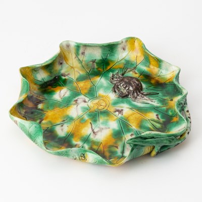 Lot 181 - A Chinese Glazed Biscuit Porcelain 'Lotus' Dish