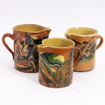 Lot 80 - Group of Three French Jaspe Ceramic Pitchers