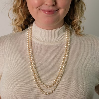 Lot 122 - Long Double Strand Cultured Pearl Necklace with Gold, Cultured Pearl and Diamond Clasp