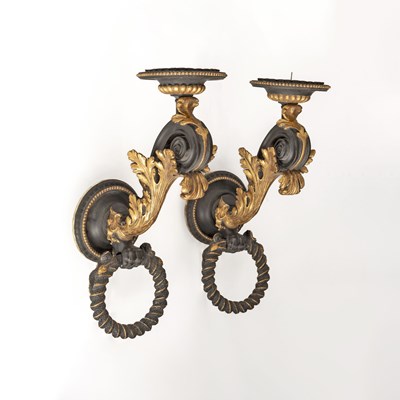 Lot 1105 - Pair of Gilt and Ebonized Carved Wood Candle Brackets