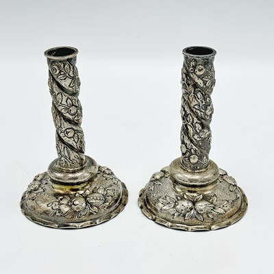 Lot 1163 - Pair of Continental Repousse Silver Candlesticks