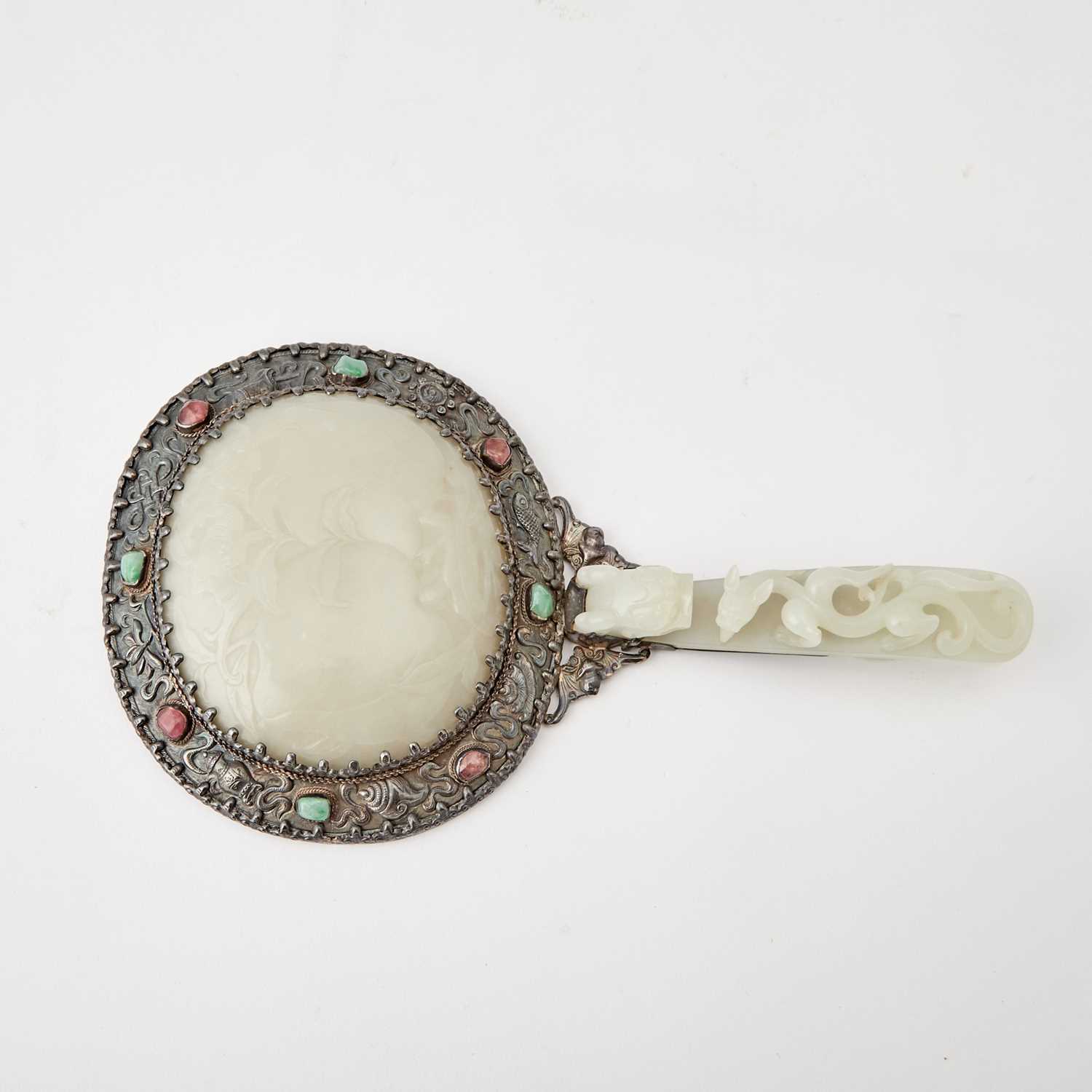 Lot 75 - A Chinese White Jade and Silver Hand Mirror