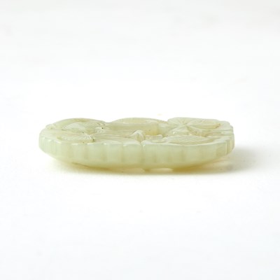 Lot 51 - A Chinese Carved Celadon Jade Plaque