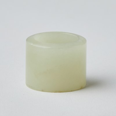 Lot 450 - A Chinese White Jade Thumb Ring