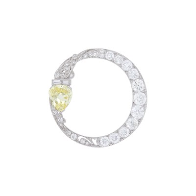 Lot 180 - Platinum, Fancy Intense Yellow Diamond and Diamond Circle Brooch