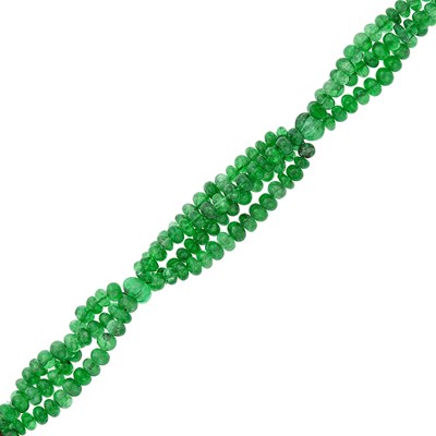 Lot 189 - Cartier Triple Strand Emerald Bead Torsade Bracelet with Platinum, Diamond and Coral Clasp