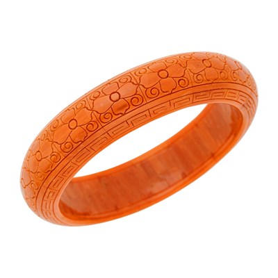 Lot 105 - Carved Coral Bangle Bracelet