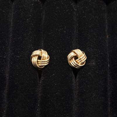 Lot 155 - Pair of 14KT Gold Knotted Studs