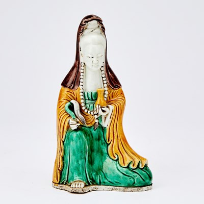 Lot 610a - A Chinese Glazed Biscuit Porcelain Figure of Guanyin